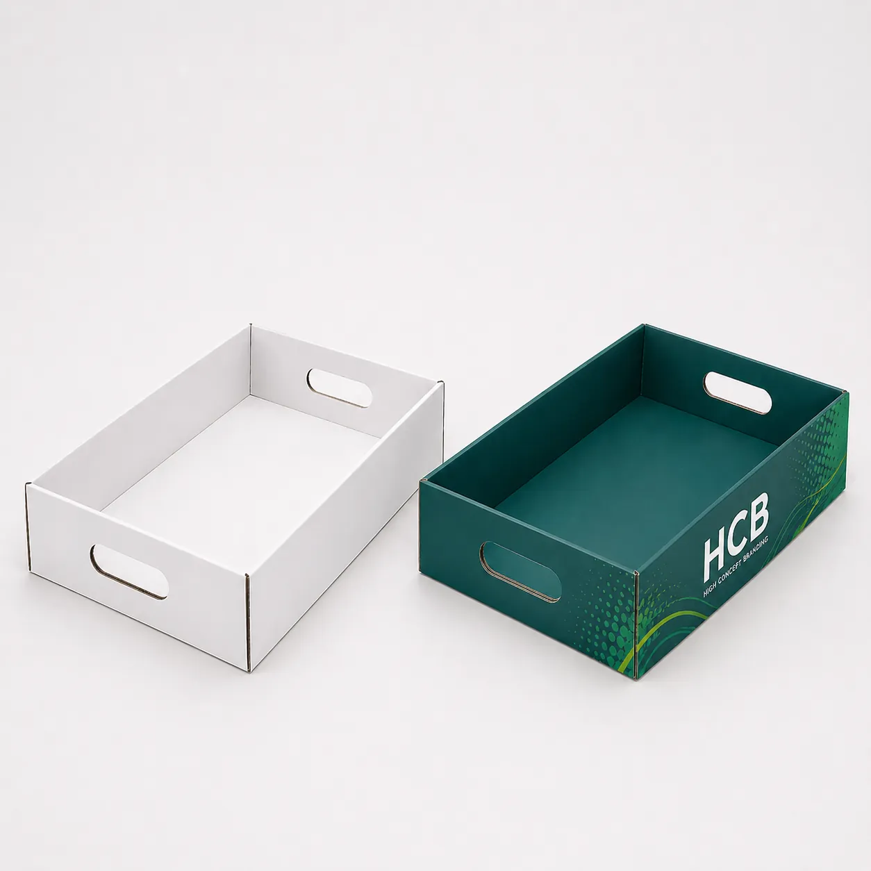 Empty white and teal cardboard tray packaging with die-cut handles. class=